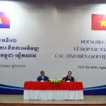 Những cơ chế và chính sách nào được áp dụng để hỗ trợ và thúc đẩy hoạt động xuất nhập khẩu giữa hai quốc gia Việt Nam và Campuchia